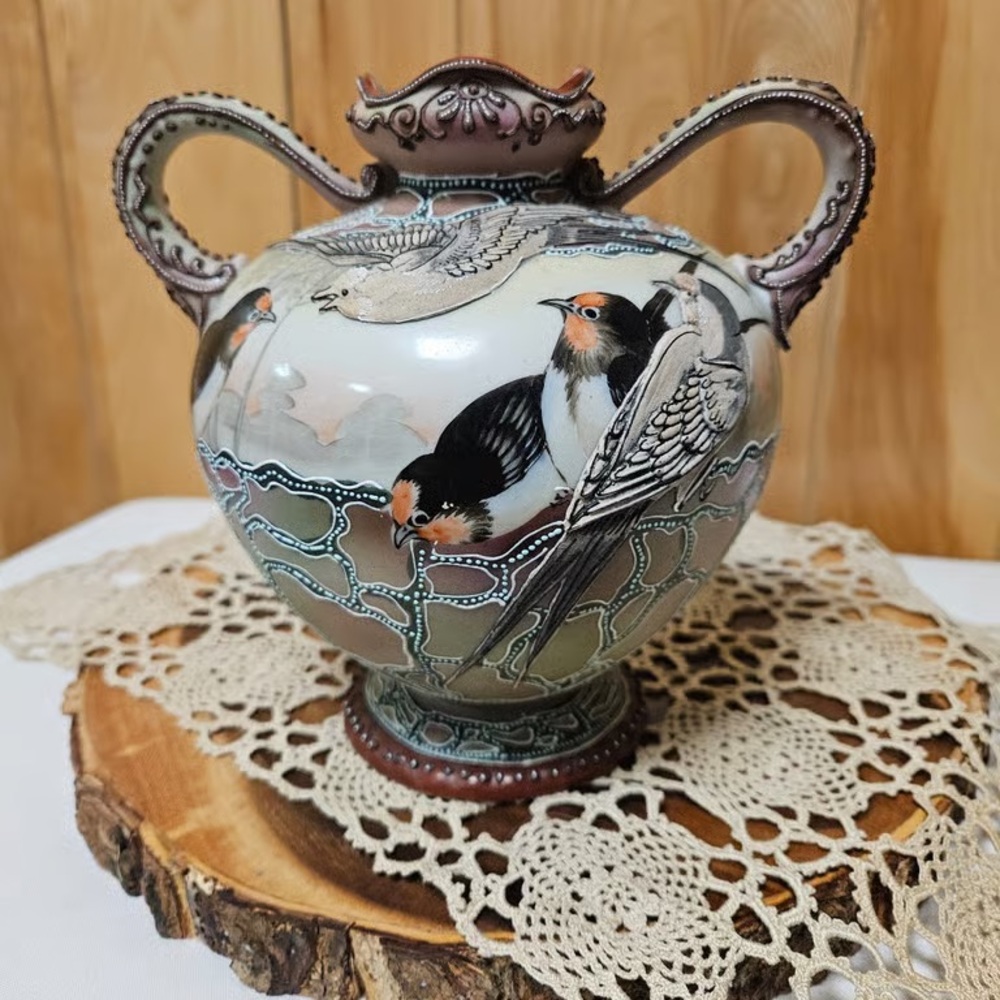 Elegant Handcrafted Vase with Bird Design